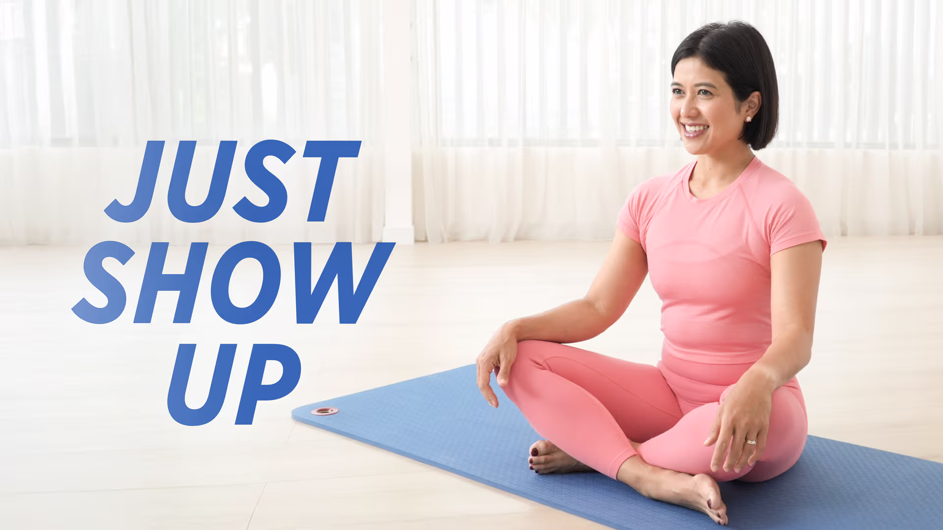 Person in comfortable position on mat performing gentle Pilates movements
